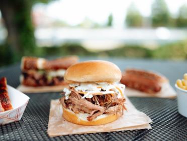 LoLo's pulled pork sandwich, ribs, More Cowbell sandwich, smoked sausage sandwich, mac & cheese