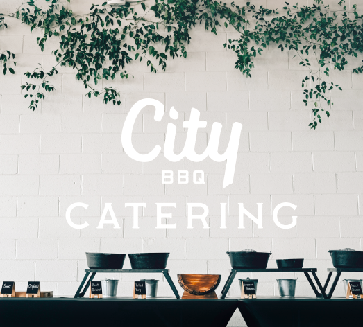 City Barbeque Catering logo over a buffet setup