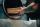 City Barbeque pitmaster loading smoker