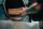 City Barbeque pitmaster loading smoker